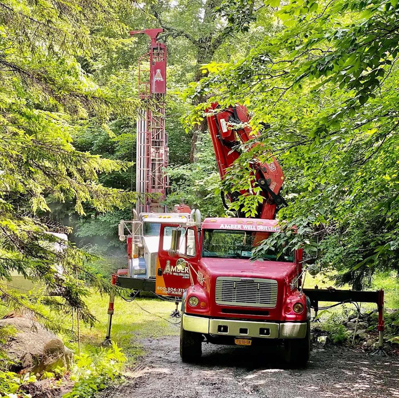 Two Amber Water Pros trucks on their way to a water well repair in Upstate NY & NE PA.