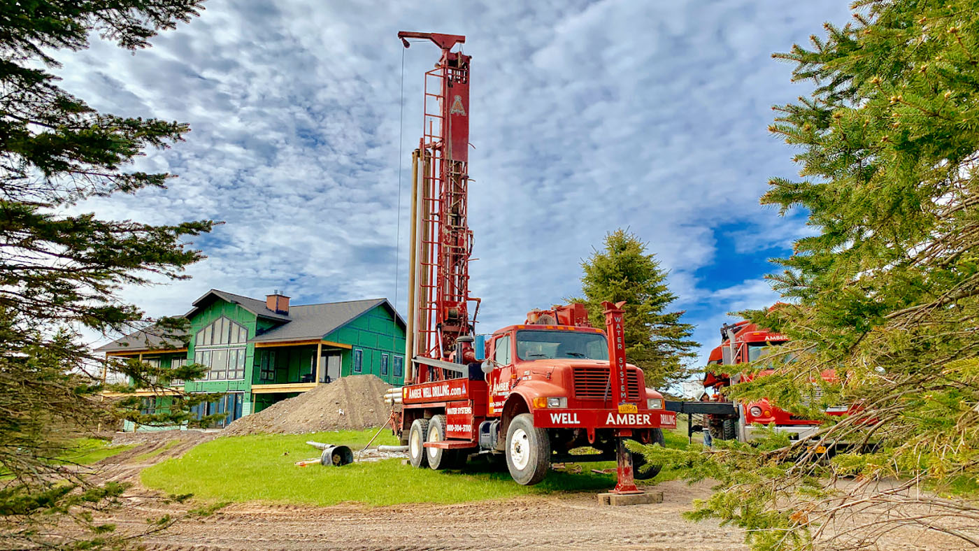 A Amber Water Pros truck, we are the top water well drilling company in Clay, NY.