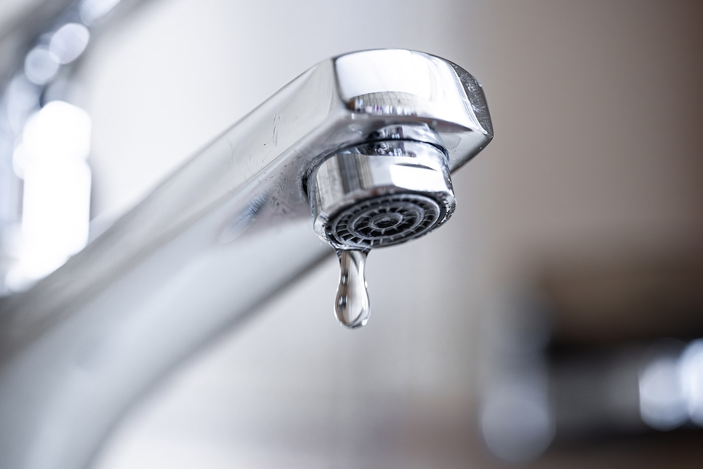 An image of a water faucet - Amber Water Pros.