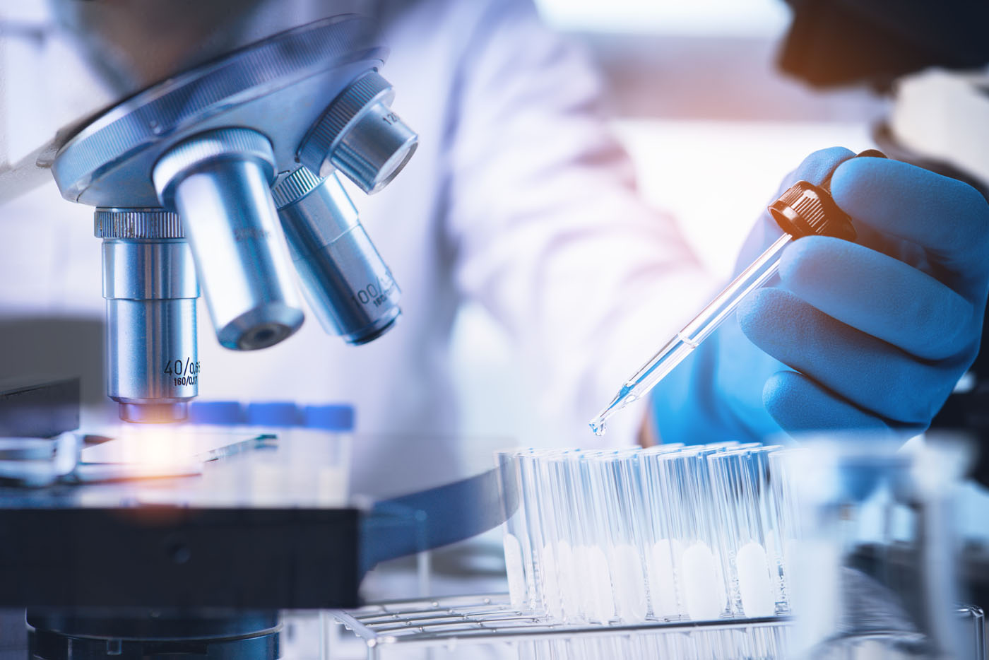 A professional analyzing water quality - choose Amber Water Pros to protect your home and family with profesisonal Upstate NY & NE PA water quality testing.